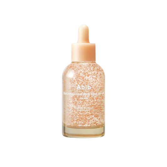 ABIB Glutathiosome Dark Spot Serum Vita Drop is a brightening serum designed to target dark spots and even skin tone. Enriched with Niacinamide, Glutathione, and multiple forms of Vitamin C, it helps fade pigmentation while boosting radiance. Ingredients like Centella Asiatica, Beta-Glucan, and Madecassoside soothe and strengthen the skin barrier. Ideal for dull, uneven skin in need of clarity and glow.