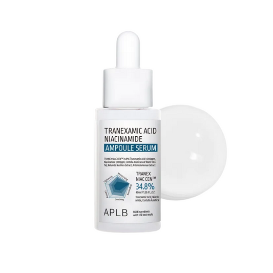APLB Tranexamic Acid Niacinamide Ampoule Serum is a brightening and calming formula designed to target dark spots and uneven skin tone. Powered by Tranexamic Acid and Niacinamide (each 1,000ppm), it helps reduce pigmentation and boost skin clarity. With Centella Asiatica Leaf Water (34.6%), Tea Tree, and Beta-Glucan, it also soothes and strengthens the skin barrier. Ideal for dull, sensitive, or blemish-prone skin.