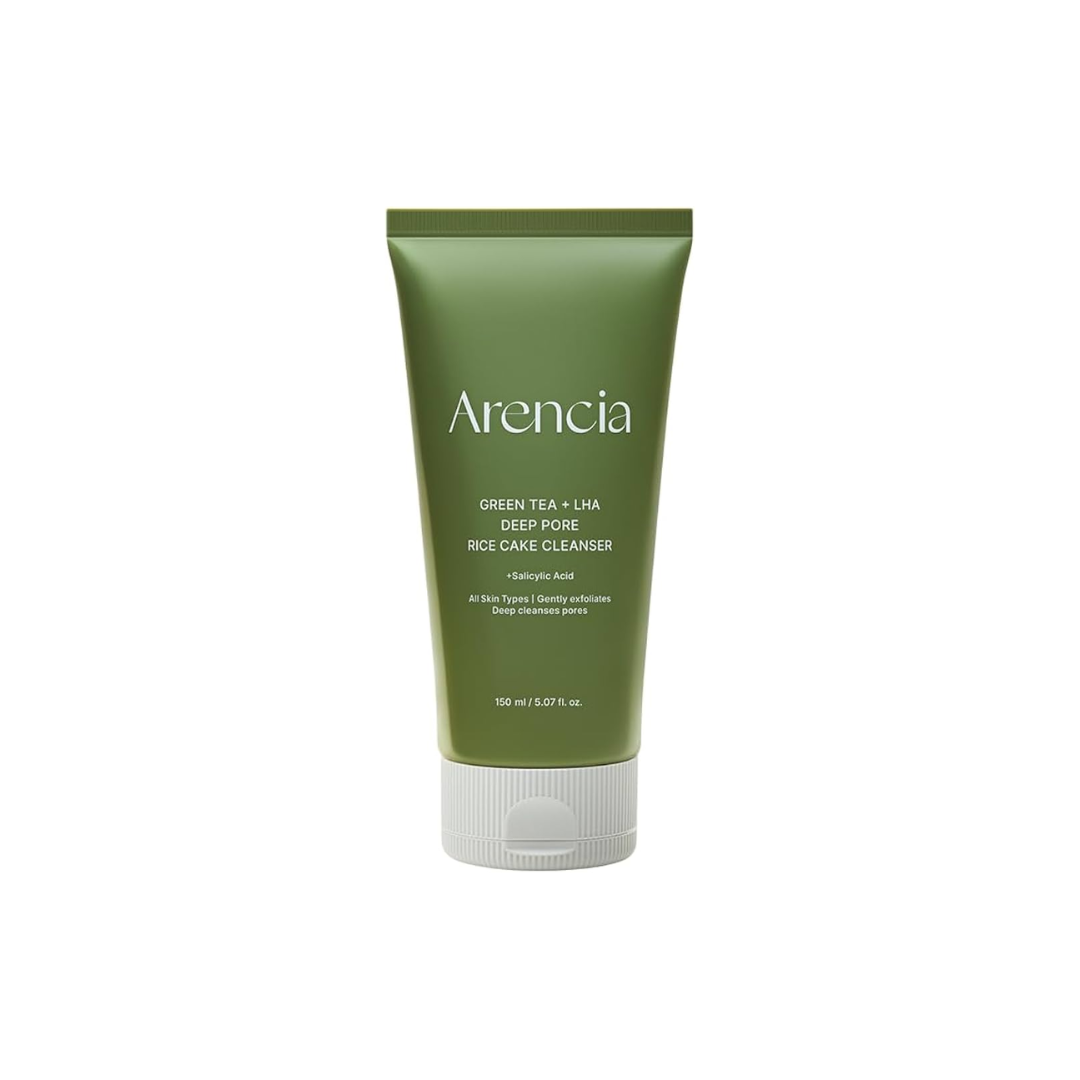 ARENCIA Green Tea + LHA Deep Pore Rice Cake Cleanser is a solid facial cleanser that gently exfoliates and clears pores. Made with Green Tea, LHA, and Rice Lees Extract, it helps remove dead skin cells and excess oil while soothing and nourishing the skin. Ideal for oily and combination skin types.