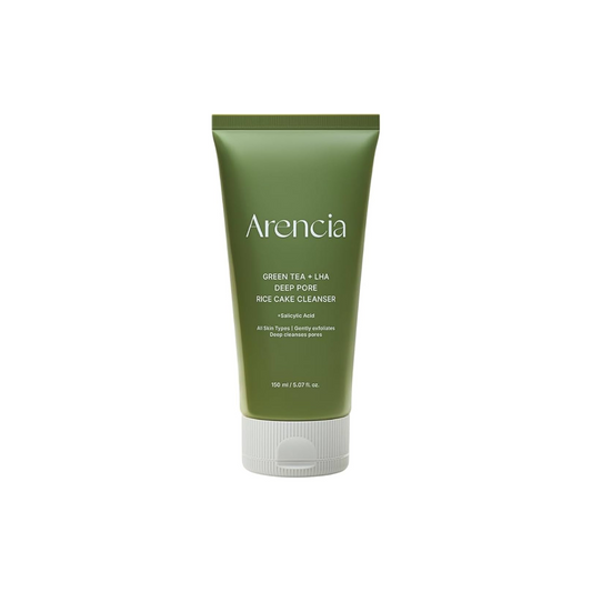 ARENCIA Green Tea + LHA Deep Pore Rice Cake Cleanser is a solid facial cleanser that gently exfoliates and clears pores. Made with Green Tea, LHA, and Rice Lees Extract, it helps remove dead skin cells and excess oil while soothing and nourishing the skin. Ideal for oily and combination skin types.