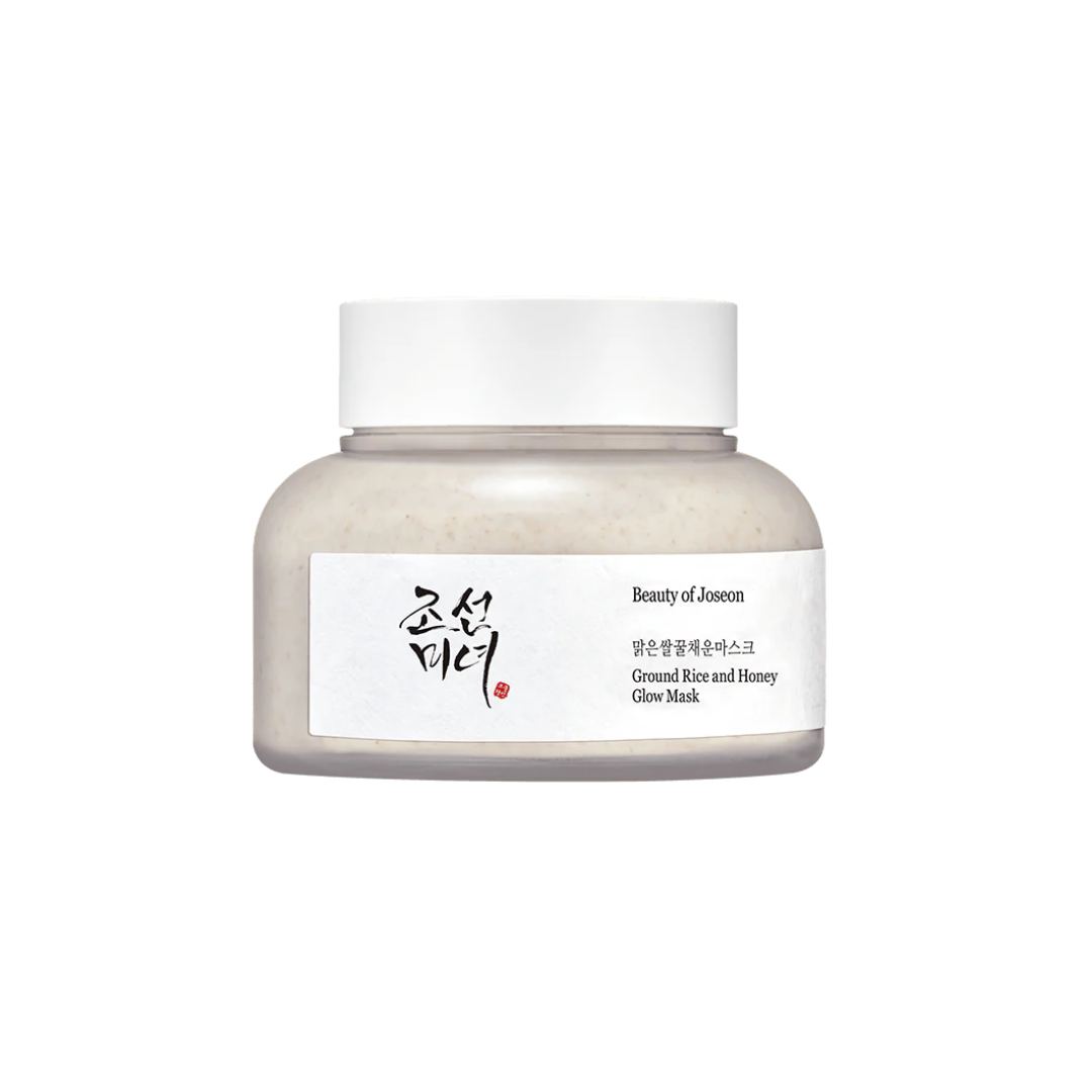BEAUTY OF JOSEON Ground Rice and Honey Glow Mask is a nourishing wash-off mask that gently exfoliates and brightens the skin. Infused with Honey and Ground Rice, it removes dead skin cells, smooths texture, and boosts radiance. With added Kaolin Clay and Rice Extracts, it helps refine pores while leaving the skin soft, hydrated, and glowing. Ideal for dull or rough skin in need of a gentle glow boost.
