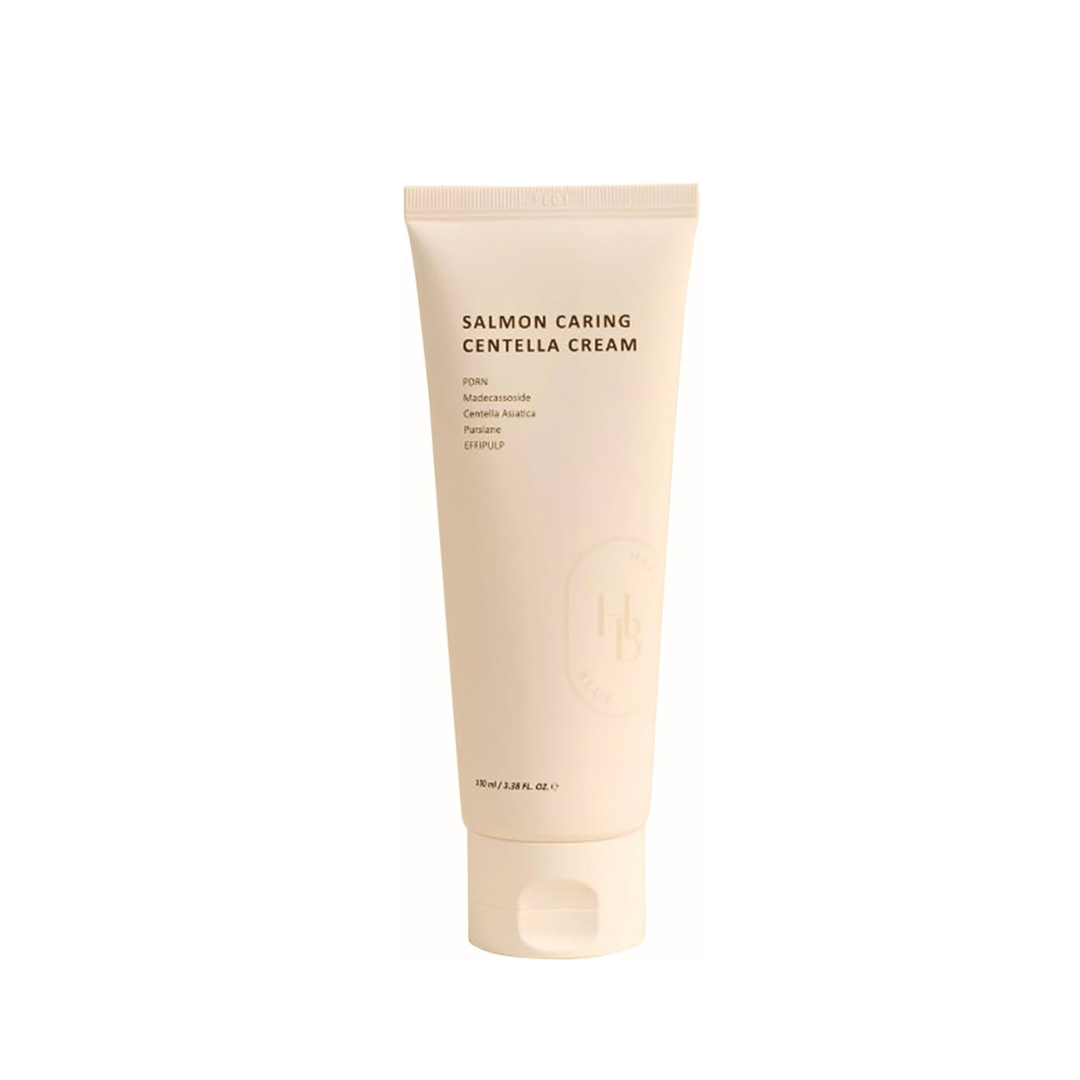 HEVEBLUE Salmon Caring Centella Cream is a soothing and nourishing moisturizer designed to calm sensitive skin and improve overall skin texture. Infused with Centella Asiatica Leaf Water and Madecassoside, it helps reduce redness and support skin healing. Salmon Egg Extract and Sodium DNA promote skin regeneration, while Hydrolyzed Collagen and Hyaluronic Acid deliver deep hydration and firming care. With added Avocado Fruit Extract, Panthenol, and Sunflower Seed Oil, this cream strengthens the skin barrier