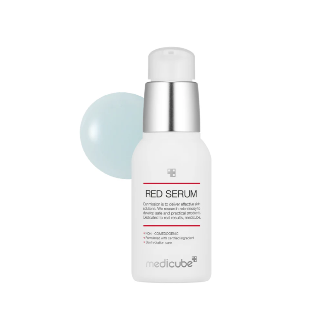 MEDICUBE Red Serum 2.0 is a lightweight serum designed to calm and improve acne-prone skin. Infused with Niacinamide, Salicylic Acid, and Tea Tree Leaf Oil, it helps reduce excess sebum, soothe irritation, and refine pores. Plant extracts and Zinc PCA support a clearer, more balanced complexion.