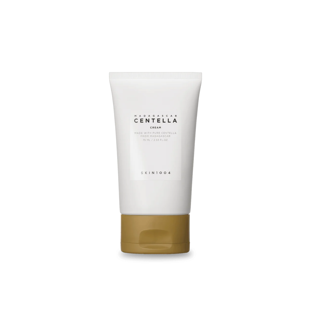 SKIN1004 Madagascar Centella Cream is a soothing and nourishing moisturizer designed to calm and strengthen sensitive skin. Infused with Centella Asiatica Extract, Madecassoside, and Panthenol, it helps reduce redness and support skin barrier repair. Enriched with hydrating and softening ingredients like Glycerin, Shea Butter, Macadamia Oil, and Squalane, this cream delivers lasting moisture without feeling heavy. Niacinamide brightens the complexion, while Ceramide NP and Sodium Hyaluronate work to reinfor