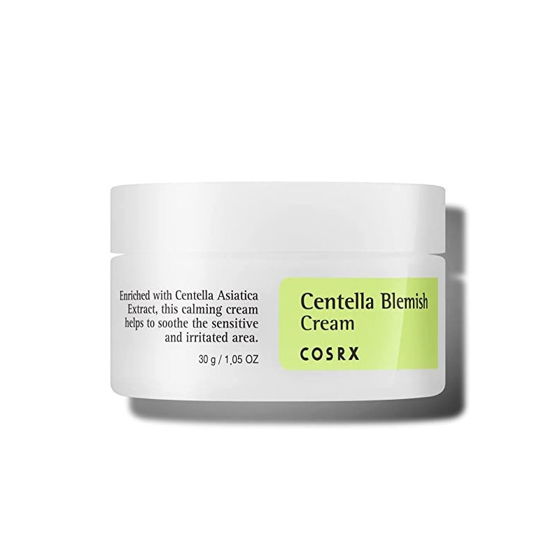COSRX Centella Blemish Cream is a soothing spot treatment designed to calm and heal troubled skin. Infused with Centella Asiatica Leaf Water, Zinc Oxide, and Tea Tree Leaf Oil, it helps reduce redness, support skin recovery, and control excess sebum. The creamy texture gently moisturizes without clogging pores, making it ideal for targeting blemishes and maintaining a clear, balanced complexion.