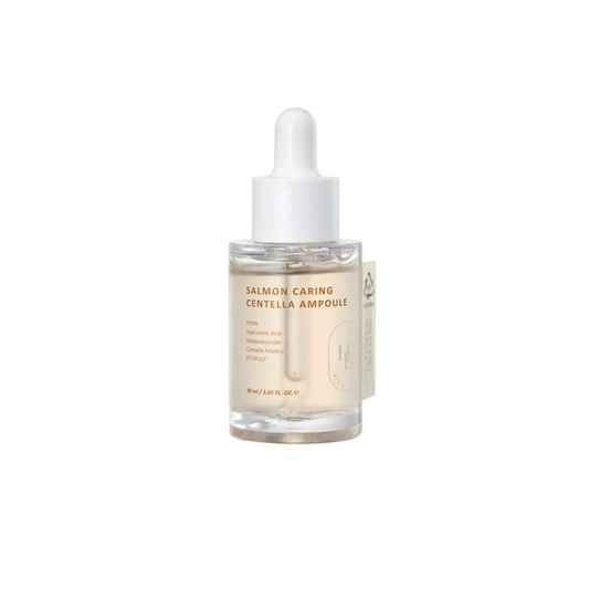 HEVEBLUE Salmon Caring Centella Ampoule is a soothing and hydrating serum made with Centella Asiatica Leaf Water and Salmon Egg Extract to calm irritation and support skin repair. Enriched with Hyaluronic Acid, Avocado Extract, and Madecassoside, it deeply hydrates and strengthens the skin barrier, leaving your skin soft, balanced, and refreshed.