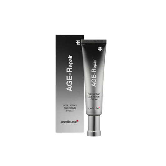 MEDICUBE Deep Lifting Age Repair Cream is a rich anti-aging moisturizer that restores firmness, hydration, and elasticity to the skin. Powered by multi-peptides including Copper Tripeptide-1, Acetyl Hexapeptide, and Palmitoyl Tripeptide-5, it helps smooth fine lines and support collagen production. Enriched with Niacinamide, Panthenol, Shea Butter, and Ceramide NP, it strengthens the skin barrier while deeply moisturizing. With added Collagen, Elastin, and Hyaluronic Acid, this cream nourishes and revitaliz
