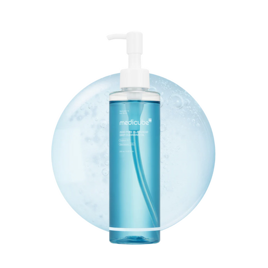 MEDICUBE Zero Pore Blackhead Deep Cleansing Oil is a lightweight, oil-based cleanser that melts away blackheads, makeup, and excess sebum. Infused with a blend of nourishing oils like Soybean, Jojoba, and Grape Seed, it deeply cleanses pores while keeping the skin soft and hydrated. Featuring Capryloyl Salicylic Acid and Niacinamide, it gently exfoliates and brightens the complexion. Suitable for daily use, this cleansing oil leaves skin feeling fresh, balanced, and visibly clearer.