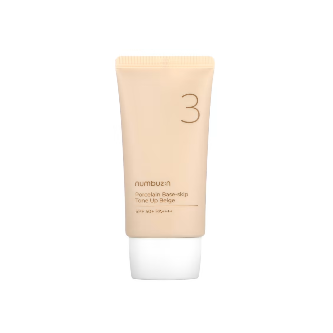 NUMBUZIN No. 3 Porcelain Base-Skip Tone Up Beige SPF50+ PA+++ is a multi-functional base that provides sun protection, tone-up, and skincare benefits in one step. Infused with Zinc Oxide and Titanium Dioxide, it ensures broad-spectrum UV protection. The lightweight formula contains Centella Asiatica Extract, Camellia Sinensis Leaf Extract, and Licorice Root Extract to soothe and brighten the skin, while Niacinamide evens out the complexion for a natural, porcelain-like finish. With a smooth texture and subt