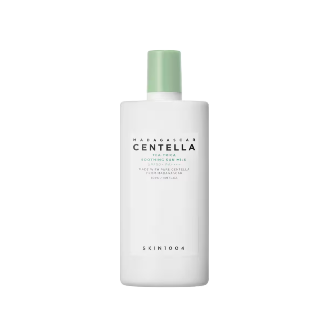 SKIN1004 Madagascar Centella Tea-Trica Soothing Sun Milk provides lightweight sun protection with a soothing touch. Formulated with Centella Asiatica Extract and Tea Tree Leaf Water, it calms and revitalizes sensitive skin while offering broad-spectrum SPF defense. Infused with Niacinamide, it brightens and balances skin tone, while a blend of Fig Fruit Extract, Evening Primrose Flower Extract, and Ceramide NP deeply hydrates and strengthens the skin barrier. This non-sticky, fast-absorbing sun milk leaves 