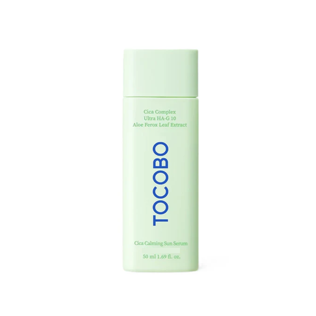 TOCOBO Cica Calming Sun Serum is a lightweight serum that soothes, hydrates, and revitalizes the skin while providing daily protection. Infused with centella asiatica extracts, madecassoside, and aloe ferox leaf extract, it calms irritation and supports the skin’s natural healing process. Hyaluronic acid in various forms ensures deep hydration, leaving the skin plump and smooth. Enriched with niacinamide for added brightening and safflower and gardenia extracts for nourishment, this serum absorbs quickly wi