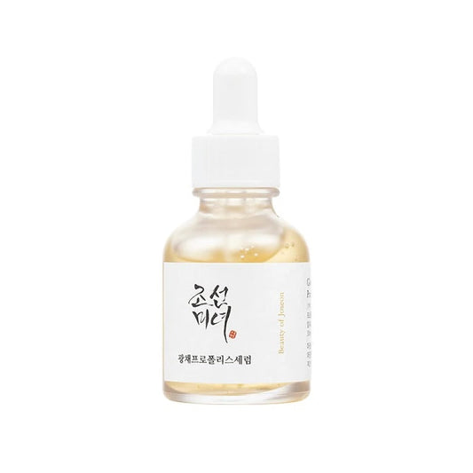 BEAUTY OF JOSEON Glow Serum: Propolis + Niacinamide is a radiance-boosting serum that helps calm, brighten, and nourish the skin. Formulated with Propolis Extract to soothe and protect, and Niacinamide to even out skin tone and refine texture, it also includes Turmeric Root Extract, Tea Tree, and Centella Asiatica for extra calming care. With Sodium Hyaluronate and Cocoa Seed Extract, it delivers lasting hydration, leaving skin dewy, smooth, and glowing.